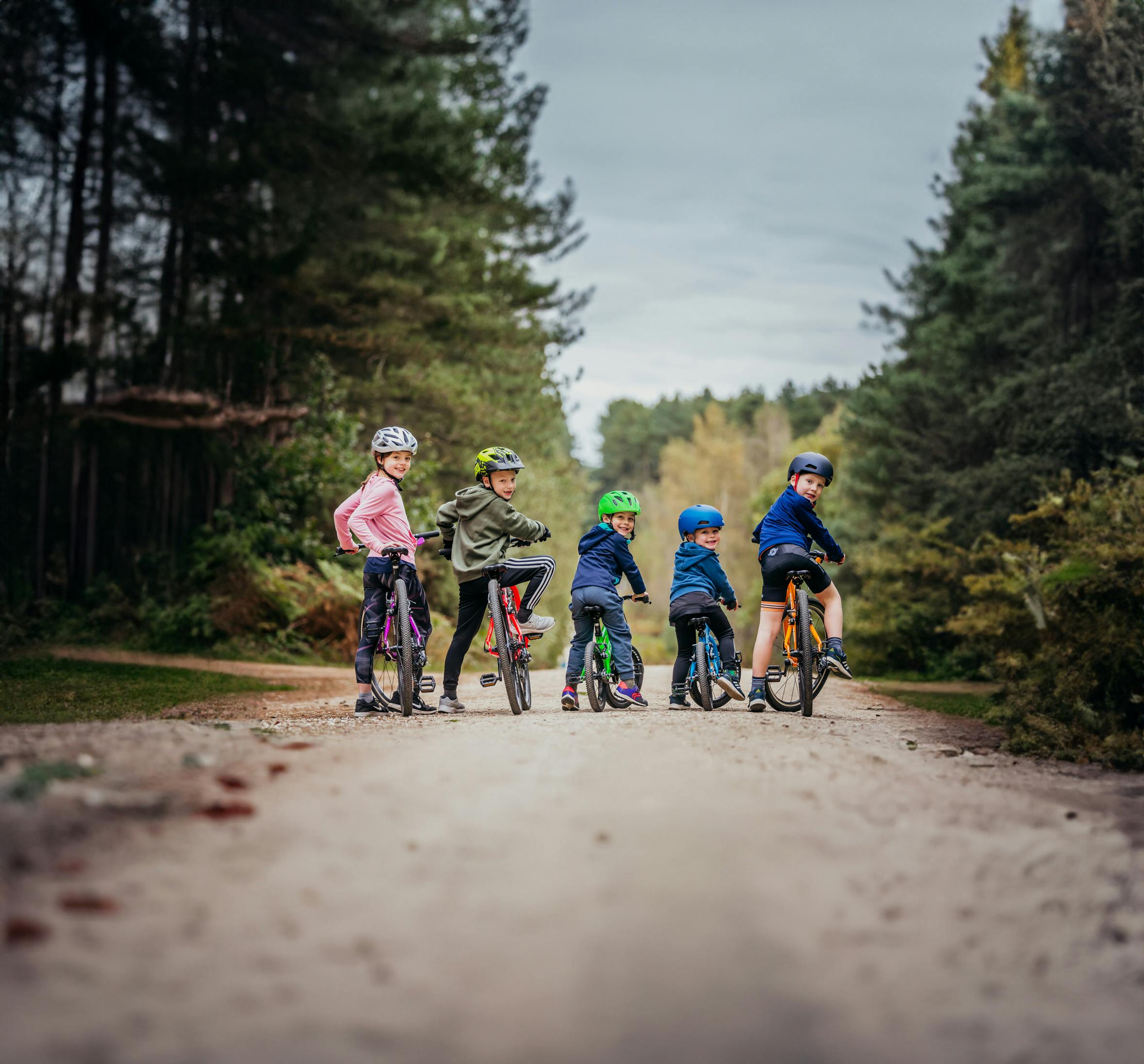 kids on bikes in the woods